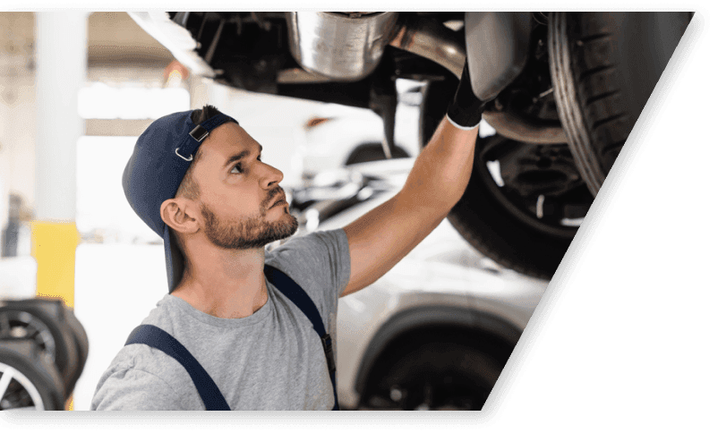 img - selective-focus-handsome-mechanic-cap-fixing-car