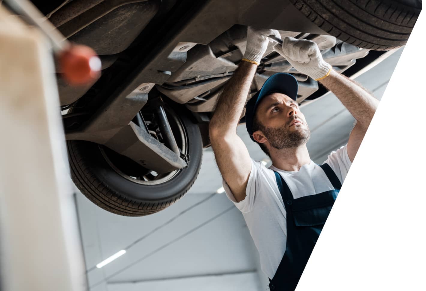 img - male-worker-holding-in-hands-electric-torch