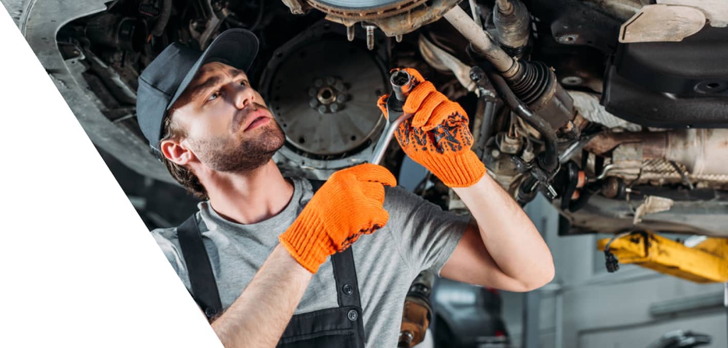 img - mechanic-at-work-in-his-garage